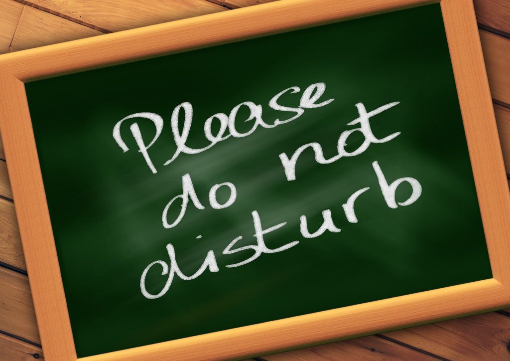chalkboard saying do not disturb