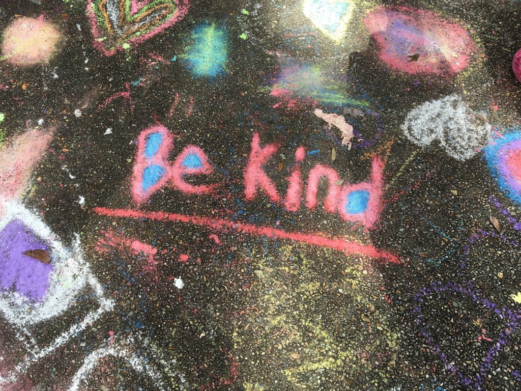 chalk that says be kind