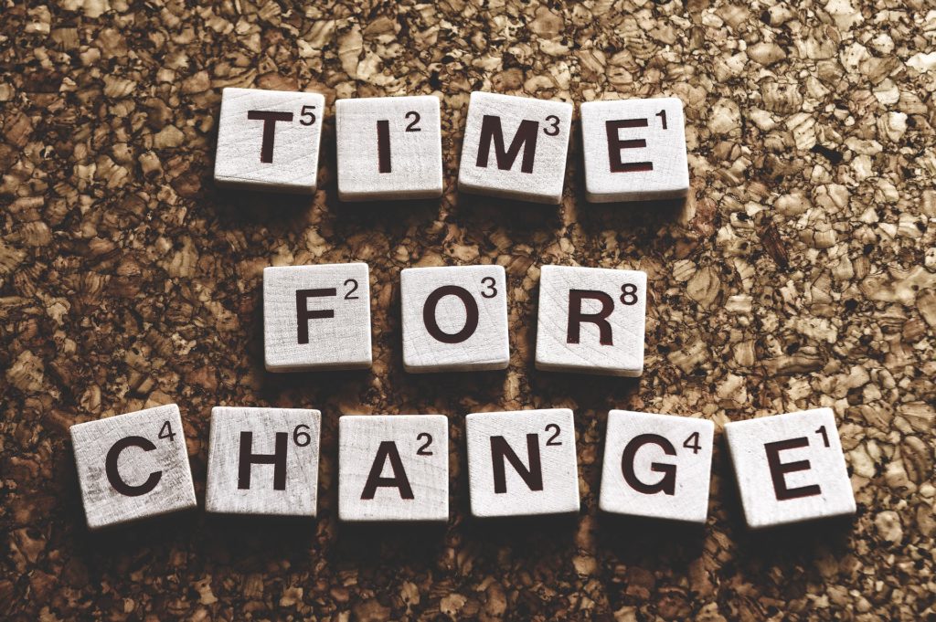 scrabble blocks that say 'time for change'