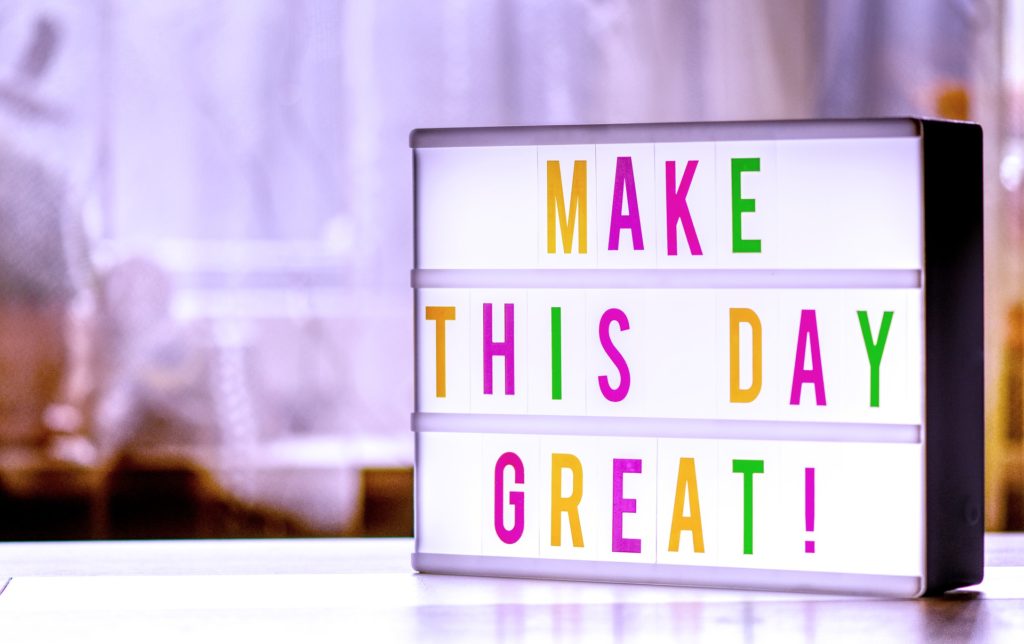 sign that says 'make this day great!'